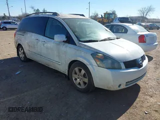2005 Nissan Quest SE with VIN 5N1BV28U65N129959, listed as a IAAI auction lot 41696308 with 157,564 mi miles. Bid and sale history available at carsss.com. Image 1.