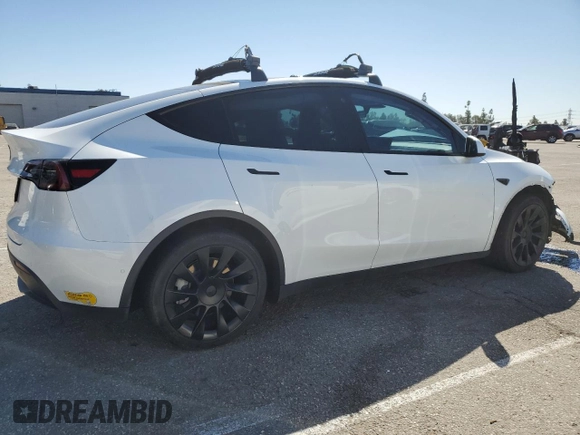 2022 Tesla Model Y Long Range with VIN 7SAYGDEE4NF357428, listed as a Copart auction lot 50345715 with 45,168 mi miles and Salvage Title. Bid and sale history available at carsss.com. Image 3.