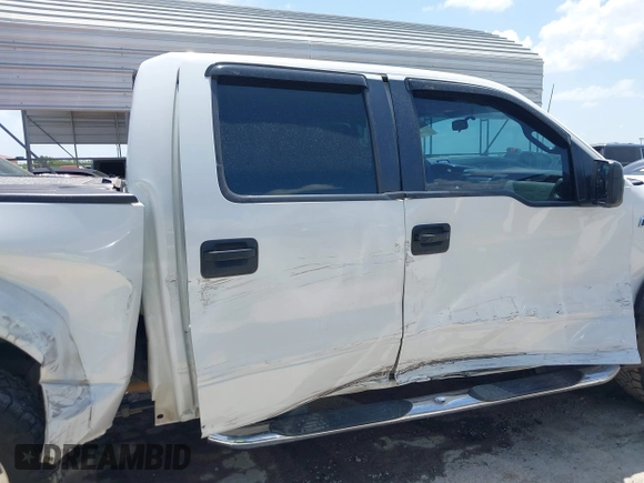 2013 Ford F-150 XL with VIN 1FTEW1CM1DFA73518, listed as a IAAI auction lot 42547017 with 173,416 mi miles and . Bid and sale history available at DreamBid. Image 14.