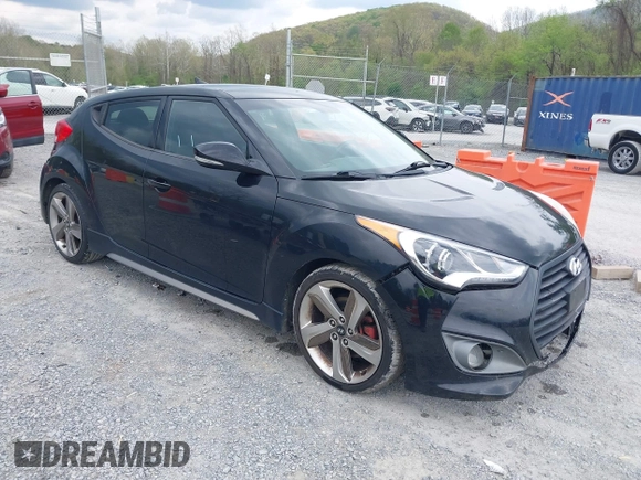 2013 Hyundai Veloster Turbo z VIN KMHTC6AE7DU106831, wystawiony jako IAAI lot #42115348 z przebiegiem 166 914 mil mil oraz . Historia ofert i sprzedaży dostępna na DreamBid. Obrazek 1.