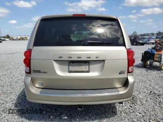 2014 Dodge Grand Caravan SXT z VIN 2C4RDGCG8ER266814, wystawiony jako Copart lot #52053155 z przebiegiem 279 551 mil mil oraz Tytuł czysty. Historia ofert i sprzedaży dostępna na DreamBid. Obrazek 6.