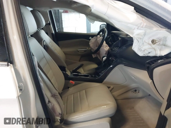 2016 Ford Escape Titanium with VIN 1FMCU9J90GUA18743, listed as a IAAI auction lot 42419730 with 102,666 mi miles and . Bid and sale history available at DreamBid. Image 5.