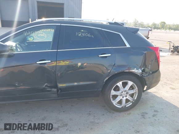 2014 Cadillac SRX Performance Collection with VIN 3GYFNFE35ES663320, listed as a IAAI auction lot 42480235 with 112,406 mi miles and . Bid and sale history available at DreamBid. Image 6.