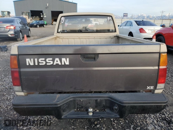 1986 Nissan Hardbody E z VIN JN6ND11S1GW037479, wystawiony jako Copart lot #81775934 z przebiegiem 389 841 mil mil oraz Szkoda całkowita • Salvage title. Historia ofert i sprzedaży dostępna na DreamBid. Obrazek 6.
