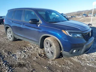 2019 Honda Passport EX-L with VIN 5FNYF7H50KB012132, listed as a IAAI auction lot 41327682 with 56,653 mi miles and . Bid and sale history available at carsss.com. Image 1.
