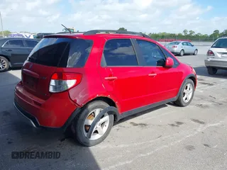 2009 Suzuki SX4 AWD with VIN JS2YB413496202028, listed as a IAAI auction lot 41930233 with 169,063 mi miles and . Bid and sale history available at DreamBid. Image 4.