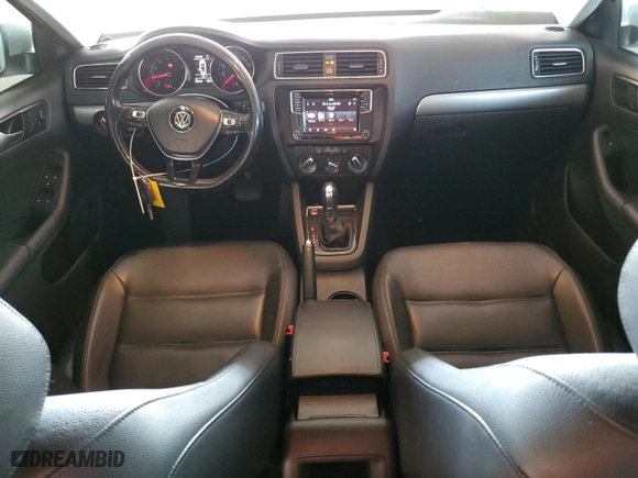 2018 Volkswagen Jetta 1.4T SE with VIN 3VWDB7AJ1JM217709, listed as a Copart auction lot 50658165 with 84,972 mi miles and Salvage Title. Bid and sale history available at carsss.com. Image 8.