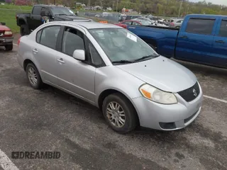 2013 Suzuki SX4 LE with VIN JS2YC5A36D6100791, listed as a IAAI auction lot 41909191 with 180,597 mi miles. Bid and sale history available at carsss.com. Image 1.