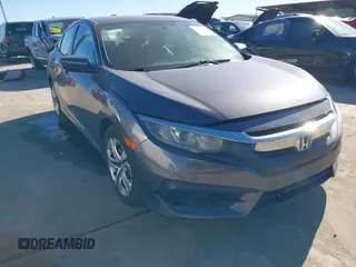 2017 Honda Civic LX z VIN 19XFC2F58HE012626, wystawiony jako IAAI lot #41458898 z przebiegiem 120 354 mil mil oraz . Historia ofert i sprzedaży dostępna na DreamBid. Obrazek 1.