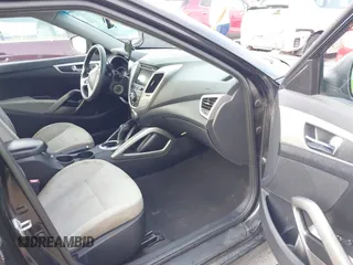 2013 Hyundai Veloster w/Gray Int with VIN KMHTC6ADXDU086856, listed as a IAAI auction lot 42503453 with 187,657 mi miles and . Bid and sale history available at DreamBid. Image 5.