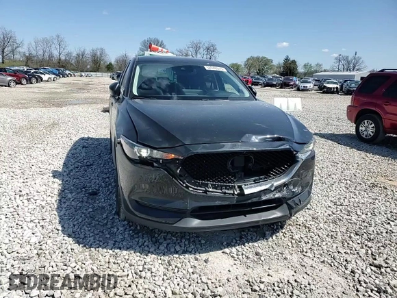 2021 Mazda CX-5 Touring z VIN JM3KFBCM5M0438706, wystawiony jako Copart lot #52048075 z przebiegiem 50 288 mil mil oraz Szkoda całkowita • Salvage title. Historia ofert i sprzedaży dostępna na DreamBid. Obrazek 11.