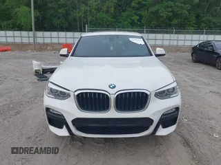 2019 BMW X4 xDrive30i with VIN 5UXUJ3C52KLG54945, listed as a IAAI auction lot 42083434 with 153,956 mi miles and . Bid and sale history available at DreamBid. Image 13.