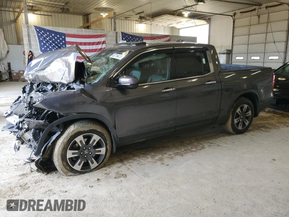 2018 Honda Ridgeline RTL-E z VIN 5FPYK3F77JB007492, wystawiony jako Copart lot #43716475 z przebiegiem Nie podano mil oraz Szkoda całkowita • Salvage title. Historia ofert i sprzedaży dostępna na DreamBid. Obrazek 1.
