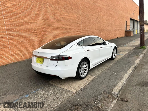 2019 Tesla Model S 75D with VIN 5YJSA1E28KF333962, listed as a Copart auction lot 54815975 with 21,203 mi miles and Salvage title. Bid and sale history available at DreamBid. Image 4.