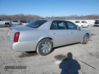 2002 Cadillac DeVille DTS with VIN 1G6KF57922U124813, listed as a Copart auction lot 87055984 with 94,769 mi miles and Salvage Title. Bid and sale history available at carsss.com. Image 3.