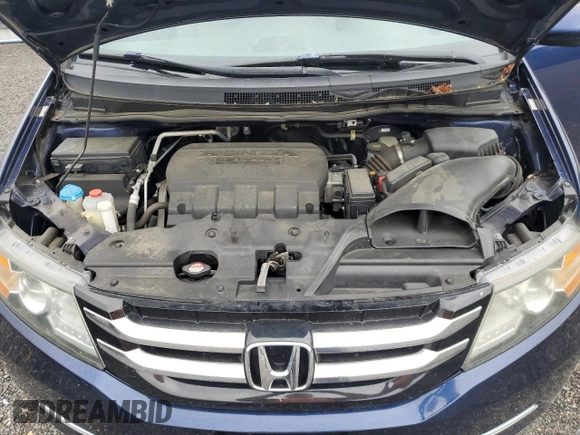 2016 Honda Odyssey EX-L z VIN 5FNRL5H61GB116310, wystawiony jako Copart lot #58028545 z przebiegiem 89 654 mil mil oraz Szkoda całkowita • Salvage title. Historia ofert i sprzedaży dostępna na DreamBid. Obrazek 12.