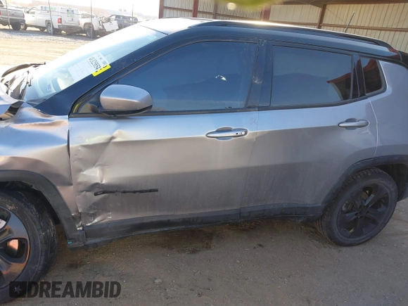 2018 Jeep Compass Latitude with VIN 3C4NJDBB1JT326239, listed as a IAAI auction lot 41325854 with 79,192 mi miles and . Bid and sale history available at DreamBid. Image 14.