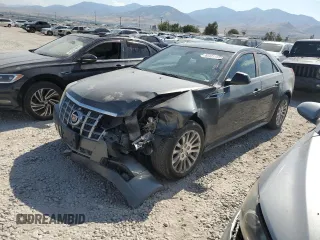 2012 Cadillac CTS Premium с VIN 1G6DS5E35C0128558, выставлен на аукционе Copart как лот 65431155 с пробегом 186 593 миль миль и Списание • Salvage title. История ставок и продаж доступна на DreamBid. Изображение 1.