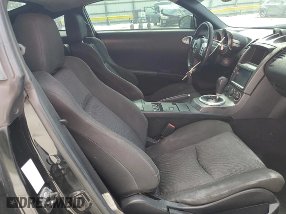 2003 Nissan 350Z Touring z VIN JN1AZ34E63T003086, wystawiony jako Copart lot #54011315 z przebiegiem 222 583 mil mil oraz Szkoda całkowita • Salvage title. Historia ofert i sprzedaży dostępna na DreamBid. Obrazek 10.