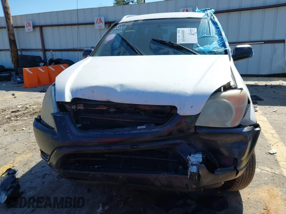 2002 Honda CR-V LX with VIN SHSRD68482U002257, listed as a IAAI auction lot 41644489 with 290,000 mi miles and . Bid and sale history available at carsss.com. Image 6.