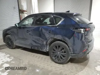 2022 Mazda CX-5 2.5 Turbo with VIN JM3KFBAY1N0636626, listed as a Copart auction lot 52257685 with 41,329 mi miles and Salvage Title. Bid and sale history available at carsss.com. Image 2.