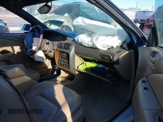 1996 Chrysler Sebring JXi with VIN 3C3EL55H6TT310724, listed as a IAAI auction lot 41424560 with Not Provided miles and . Bid and sale history available at DreamBid. Image 5.