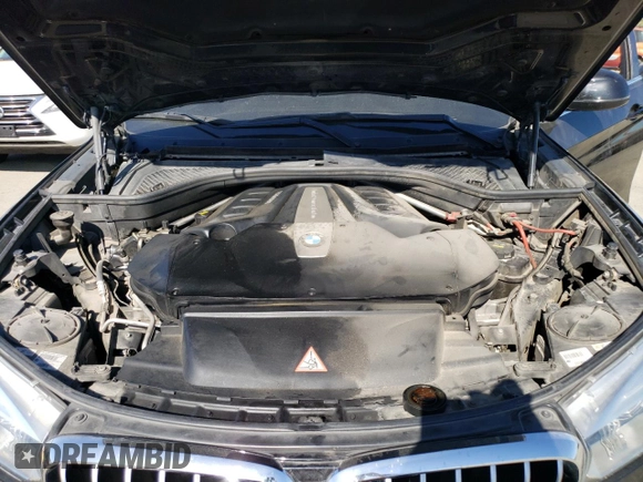 2015 BMW X6 xDrive50i with VIN 5UXKU6C53F0F94035, listed as a Copart auction lot 49604204 with 122,910 mi miles and Salvage Title. Bid and sale history available at carsss.com. Image 12.