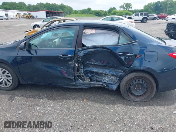 2018 Toyota Corolla L with VIN 2T1BURHEXJC003674, listed as a IAAI auction lot 42511551 with 184,697 mi miles and . Bid and sale history available at DreamBid. Image 6.