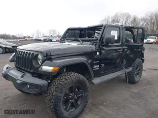 2018 Jeep Wrangler Unlimited Sahara with VIN 1C4HJXEG6JW289575, listed as a IAAI auction lot 41629737 with 74,654 mi miles. Bid and sale history available at carsss.com. Image 17.