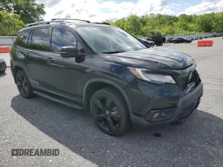 2019 Honda Passport Elite with VIN 5FNYF8H06KB003641, listed as a Copart auction lot 58218825 with 139,616 mi miles and Salvage title. Bid and sale history available at DreamBid. Image 4.