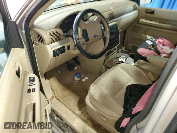 2004 Ford Freestar SE z VIN 2FMZA51634BA72234, wystawiony jako Copart lot #85695414 z przebiegiem Nie podano mil oraz Szkoda całkowita • Salvage title. Historia ofert i sprzedaży dostępna na DreamBid. Obrazek 8.