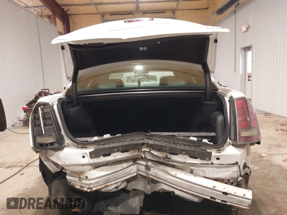 2014 Chrysler 300 with VIN 2C3CCAGGXEH384728, listed as a IAAI auction lot 41394638 with 151,362 mi miles. Bid and sale history available at carsss.com. Image 6.