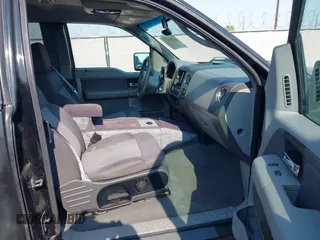 2007 Ford F-150 XLT z VIN 1FTPX14V67KD12229, wystawiony jako IAAI lot #42749433 z przebiegiem 156 168 mil mil oraz . Historia ofert i sprzedaży dostępna na DreamBid. Obrazek 5.