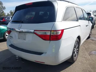 2011 Honda Odyssey EX-L with VIN 5FNRL5H67BB007777, listed as a IAAI auction lot 41402903 with 210,921 mi miles. Bid and sale history available at carsss.com. Image 4.