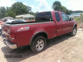 2002 Ford F-150 XL with VIN 1FTRX18W72NB97997, listed as a IAAI auction lot 42578237 with Not provided miles and . Bid and sale history available at DreamBid. Image 4.