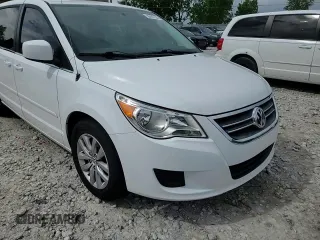 2014 Volkswagen Routan SE z VIN 2C4RVABG0ER134352, wystawiony jako Copart lot #58467235 z przebiegiem 161 822 mil mil oraz Czysty tytuł • Clean title. Historia ofert i sprzedaży dostępna na DreamBid. Obrazek 14.