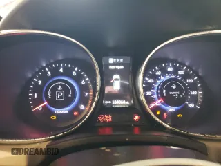 2013 Hyundai Santa Fe Sport z VIN 5XYZUDLA4DG079275, wystawiony jako Copart lot #50987665 z przebiegiem 134 064 mil mil oraz Szkoda całkowita • Salvage title. Historia ofert i sprzedaży dostępna na DreamBid. Obrazek 9.