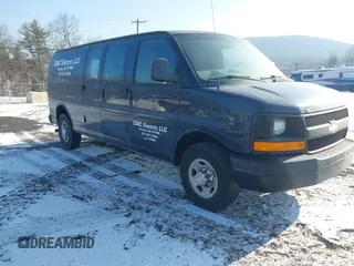 2014 Chevrolet Express Cargo Van with VIN 1GCWGGBA5E1205786, listed as a IAAI auction lot 41339085 with 201,460 mi miles. Bid and sale history available at carsss.com. Image 1.