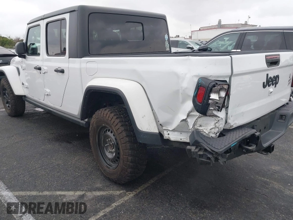 2022 Jeep Gladiator Willys with VIN 1C6HJTAG1NL148524, listed as a IAAI auction lot 41507693 with 42,004 mi miles and . Bid and sale history available at DreamBid. Image 3.