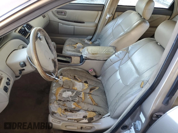 2000 Toyota Avalon XL z VIN 4T1BF28B2YU079163, wystawiony jako Copart lot #50129935 z przebiegiem 311 916 mil mil oraz Nie do naprawy • Non repairable. Historia ofert i sprzedaży dostępna na DreamBid. Obrazek 7.