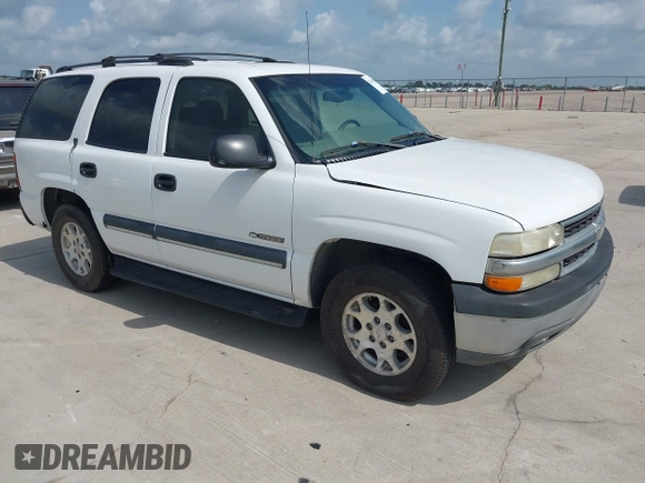 2002 Chevrolet Tahoe LS z VIN 1GNEC13Z42R214489, wystawiony jako IAAI lot #42438810 z przebiegiem 243 161 mil mil oraz . Historia ofert i sprzedaży dostępna na DreamBid. Obrazek 1.