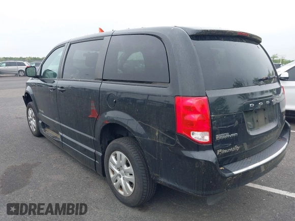 2018 Dodge Grand Caravan SE with VIN 2C7WDGBG5JR190468, listed as a IAAI auction lot 42173227 with 49,451 mi miles and . Bid and sale history available at DreamBid. Image 3.