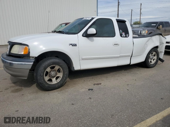 2003 Ford F-150 XL with VIN 2FTRX17283CA33843, listed as a Copart auction lot 50895714 with 115,681 mi miles and Salvage Title. Bid and sale history available at carsss.com. Image 1.