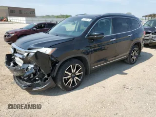 2019 Honda Pilot Touring 8-Passenger with VIN 5FNYF6H91KB068948, listed as a Copart auction lot 59999375 with 77,110 mi miles and Salvage title. Bid and sale history available at DreamBid. Image 1.