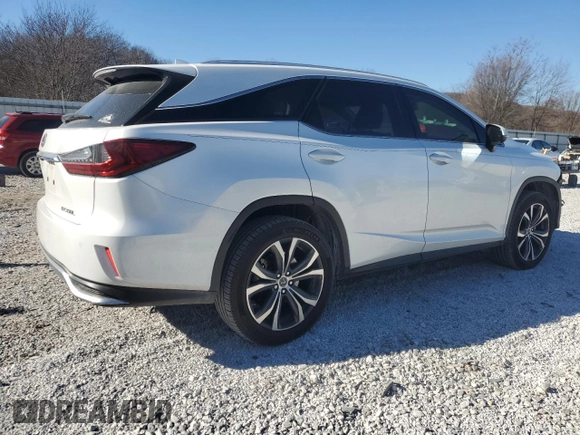 2021 Lexus RX with VIN JTJHZKFA5M2030137, listed as a Copart auction lot 42520195 with 79,355 mi miles and Salvage Title. Bid and sale history available at carsss.com. Image 3.
