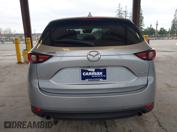 2020 Mazda CX-5 Grand Touring with VIN JM3KFADM0L0738693, listed as a IAAI auction lot 41725906 with 63,629 mi miles. Bid and sale history available at carsss.com. Image 17.
