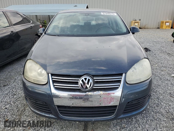 2005 Volkswagen Jetta 2.5L with VIN 3VWDG71K65M606300, listed as a Copart auction lot 57848515 with 108,928 mi miles and Salvage title. Bid and sale history available at DreamBid. Image 5.