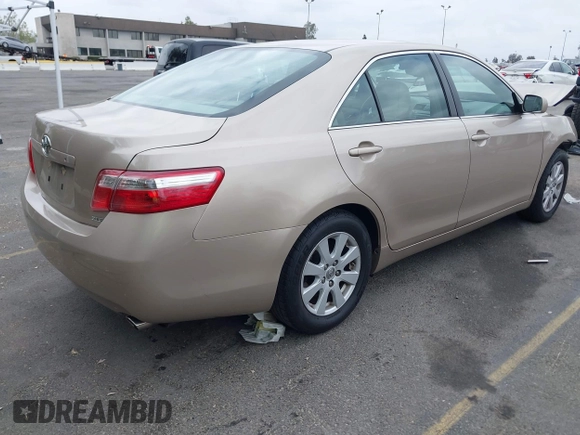 2009 Toyota Camry with VIN 4T4BE46K19R092530, listed as a IAAI auction lot 42051158 with 135,875 mi miles. Bid and sale history available at carsss.com. Image 4.