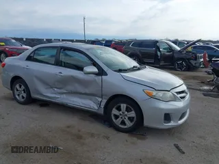2011 Toyota Corolla L with VIN 2T1BU4EEXBC571707, listed as a IAAI auction lot 41884755 with 200,210 mi miles. Bid and sale history available at carsss.com. Image 1.