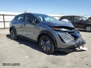 2023 Nissan ARIYA EVOLVE+ with VIN JN1DF0BB3PM705556, listed as a Copart auction lot 61039554 with 1,863 mi miles and Salvage Title. Bid and sale history available at carsss.com. Image 4.